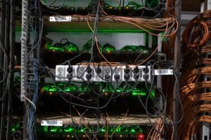 Racks of mining rigs at the Minto cryptocurrency mining center in Nadvoitsy, Russia, on Friday, Dec. 17, 2021. Bitcoin extended its five-week slide from an all-time high with risk sentiment across global financial markets dwindling.