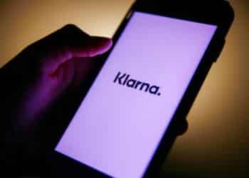 A Klarna logo on a mobile phone arranged in London, U.K., on Thursday, Jan. 21, 2021. Klarna AB, a Swedish payment provider for online shoppers, is still setting its sights on an initial public offering even after its latest funding round left it roughly twice as valuable as it was a year ago. Photographer: Hollie Adams/Bloomberg