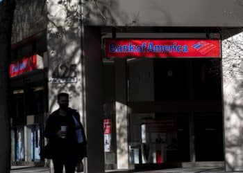 A pedestrian walks past a Bank of America bank branch in San Francisco, California, U.S., on Tuesday, April 13, 2021. Bank of America Corp. is scheduled to release earnings figures on April 15. Photographer: David Paul Morris/Bloomberg