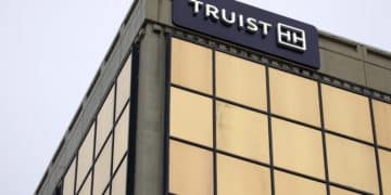Signage outside a Truist Financial Corp. bank branch in Lexington, Kentucky, U.S., on Sunday, Jan. 16, 2022. Truist Financial reported adjusted earnings per share for the fourth quarter that beat the average analyst estimate. Photographer: Luke Sharrett/Bloomberg