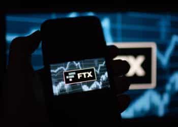 The FTX Cryptocurrency Derivatives Exchange logo on a digital device arranged in Riga, Latvia, Nov. 24, 2022. The implosion of Sam Bankman-Frieds FTX empire dealt a harsh blow to the Bahamas ambitions to be a hub for the crypto industry, and its causing massive pain for locals who treated the now-bankrupt exchange like a bank. Photographer: Andrey Rudakov/Bloomberg