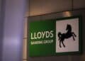 A sign at the headquarters of Lloyds Banking Group Plc in London, UK, on Monday, March 20, 2023. European stocks slumped on Monday, as UBS Group AGs agreement to buy Credit Suisse Group AG failed to assuage fears about potential global banking turmoil. Photographer: Jason Alden/Bloomberg