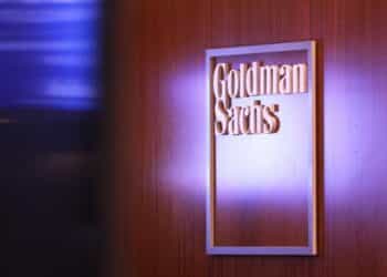 NEW YORK, NEW YORK - SEPTEMBER 13: The Goldman Sachs logo is seen on at the New York Stock Exchange on September 13, 2022 in New York City. Goldman Sachs announced today a plan to cut several hundred jobs this month, making it the first Wall Street firm to take steps to cut down on expenses amid a drop in volume of deals after pausing layoffs for two years during the coronavirus (COVID-19) pandemic. (Photo by Michael M. Santiago/Getty Images)