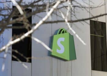 A logo outside Shopify headquarters in Ottawa, Ontario, Canada, on Tuesday, Feb. 14, 2023. Shopify Inc. was among the first technology giants to slash its workforce during last years market rout. Now, some investors say its stock is poised to outperform peers over the course of 2023 as those job cuts translate into lower costs, narrower losses and better cash flow.