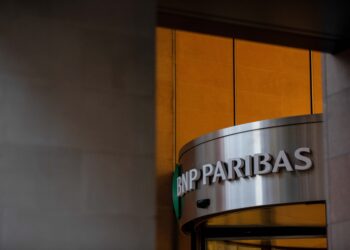 A sign at the entrance to the BNP Paribas SA headquarters in London, UK, on Thursday, May 19, 2022. BNP saw pickup in deposits in a flight to quality amid banking turmoil earlier this year, Chief Financial Officer Lars Machenil said in Bloomberg TV interview on May 3, 2023. Photographer: Chris J. Ratcliffe/Bloomberg
