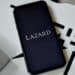 The Lazard logo on a smartphone arranged in the Brooklyn borough of New York, US, on Friday, April 28, 2023. Lazard Ltd. posted a surprise loss for the first quarter and said it plans to reduce its workforce by 10% this year, predicting the industrys dealmaking slump will last through 2023. Photographer: Gabby Jones/Bloomberg