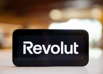 The Revolut Ltd. logo on a smartphone arranged in London, UK, on Friday, July 26, 2024. Revolut said it received a British banking license from regulators, a move that allows the fintech firm to better challenge traditional banking giants. Photographer: Betty Laura Zapata/Bloomberg