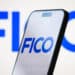 The Fair Isaac Corp. (FICO) logo displayed on a smartphone screen, on April 23, 2025.