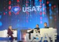 Tether Holdings CEO Paolo Ardoino, center, and Bo Hines, CEO of Tether USAT, right, announced plans to issue a US regulated, dollar-backed stablecoin during a press conference in New York on Friday, Sept. 12, 2025. Journalist Eleanor Terrett, left, interviews them.