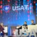 Tether Holdings CEO Paolo Ardoino, center, and Bo Hines, CEO of Tether USAT, right, announced plans to issue a US regulated, dollar-backed stablecoin during a press conference in New York on Friday, Sept. 12, 2025. Journalist Eleanor Terrett, left, interviews them.